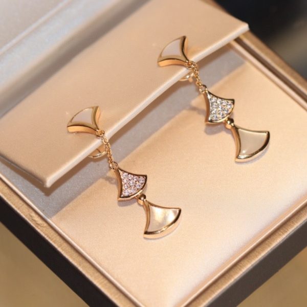 BVLGARI tassel skirt in rose gold and 18k stud earrings