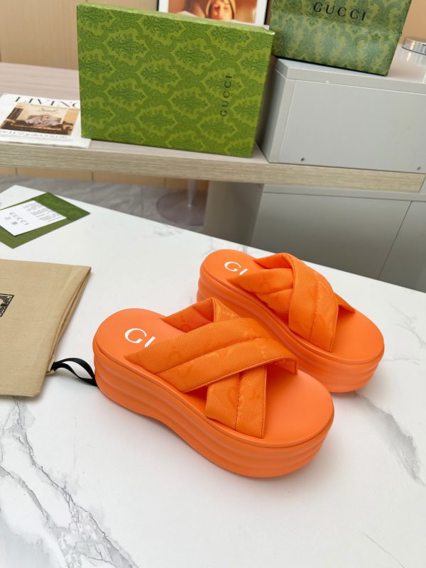 Gucci’s latest GG platform slippers are a leg puller orange
