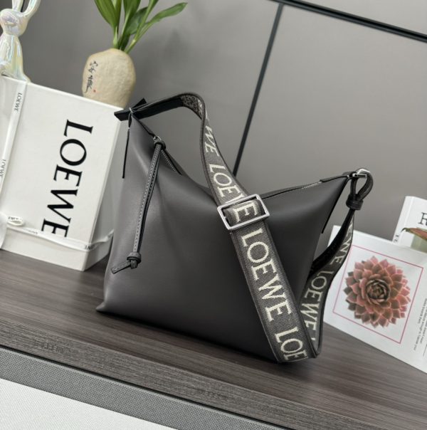 New small cubi bag in soft and smooth calfskin and jacquard