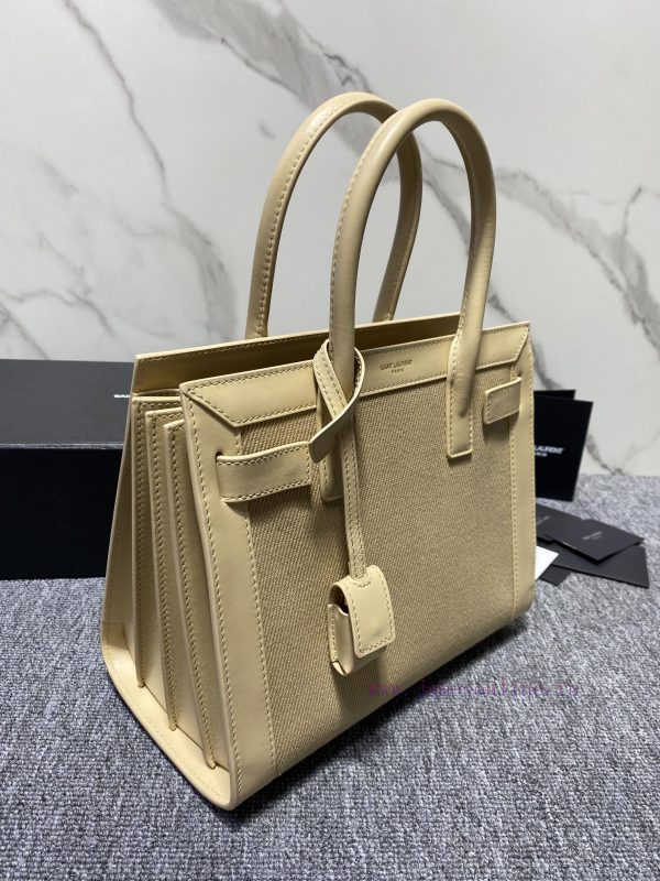 YSL's new Sac de jour organ bag features a brand new contrasting color scheme. The light col onqmb75u - Image 4