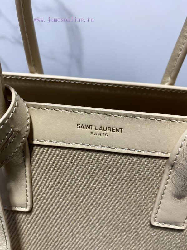 YSL's new Sac de jour organ bag features a brand new contrasting color scheme. The light col onqmb75u - Image 6